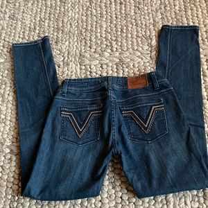 Vigoss Collection “fit and skinny” double button jean